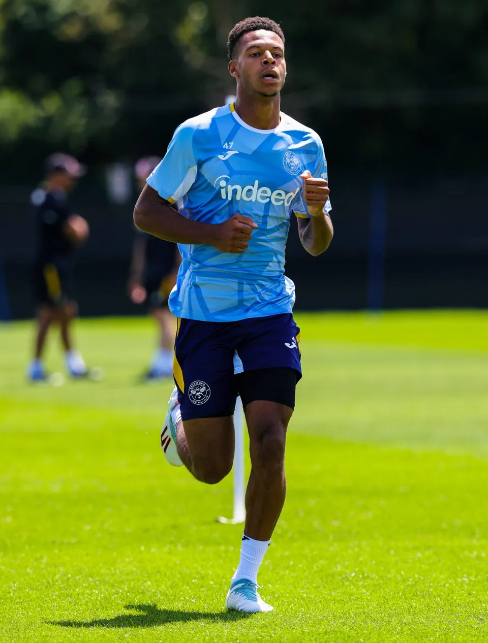 Kaye Furo jogging at training